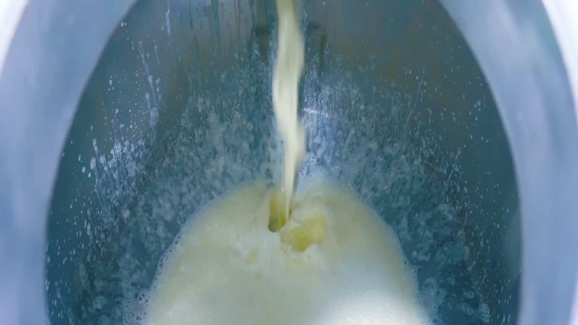 Tofu being prepared in a deep, rich braising broth